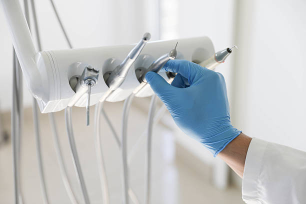 Professional Tooth Extraction technician working in Granbury, TX